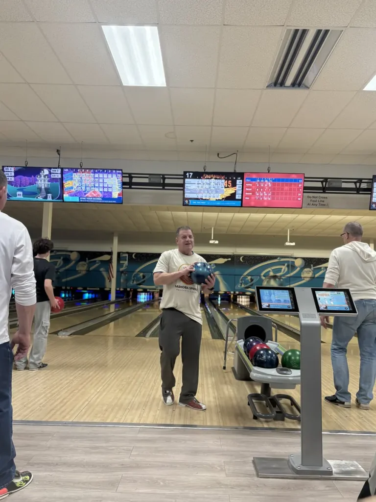 Man getting ready to bowl at the Nashoba Springs bowling outing