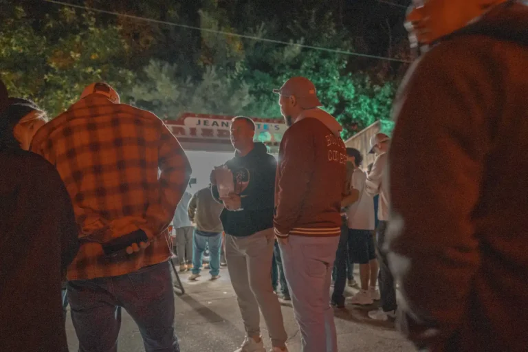 Guests in plaid jackets walking through Fright Kingdom