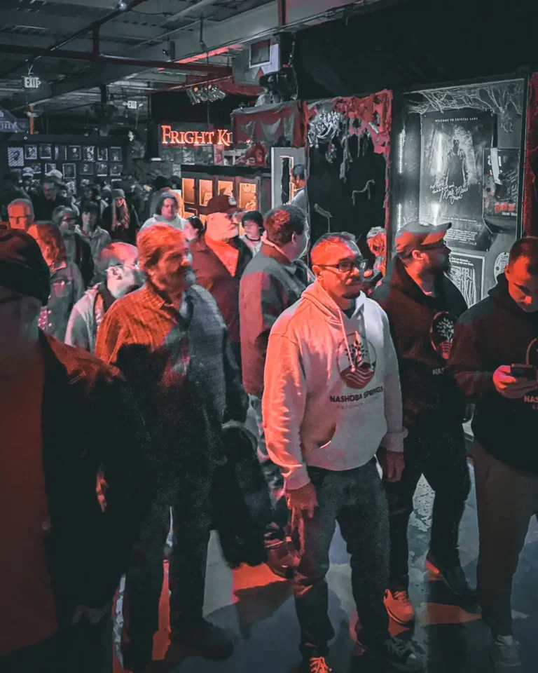 Guests in line inside a Fright Kingdom attraction